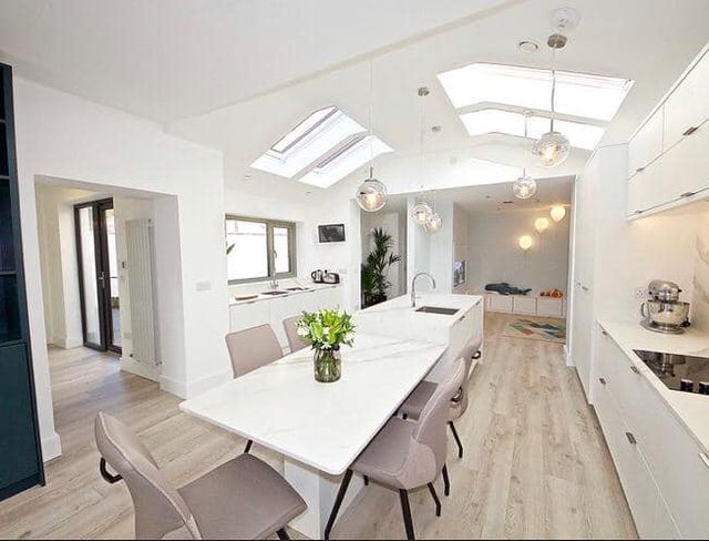 Beautiful laminate wood flooring installed in a kitchen