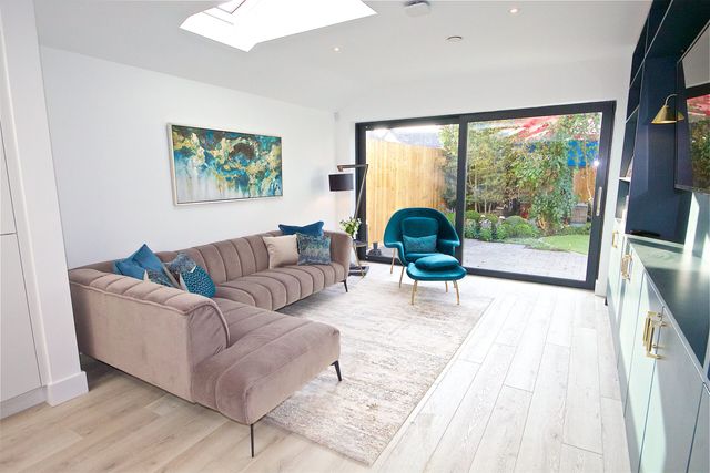 Wood laminate flooring in an apartment sitting room